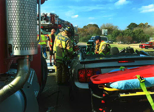 Firefighters At Car Accident Site